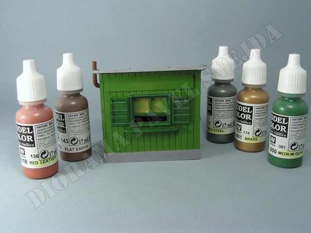 trafika6.jpg - Dveře, okenice a r&aacute;my jsou nabarveny barvou 850, klika, panty a drž&aacute;ky novin 865, zd&iacute;řka kom&iacute;nku 801, kom&iacute;n směs&iacute; 818 + 983 (v&scaron;e barvy Vallejo na &scaron;tětec).